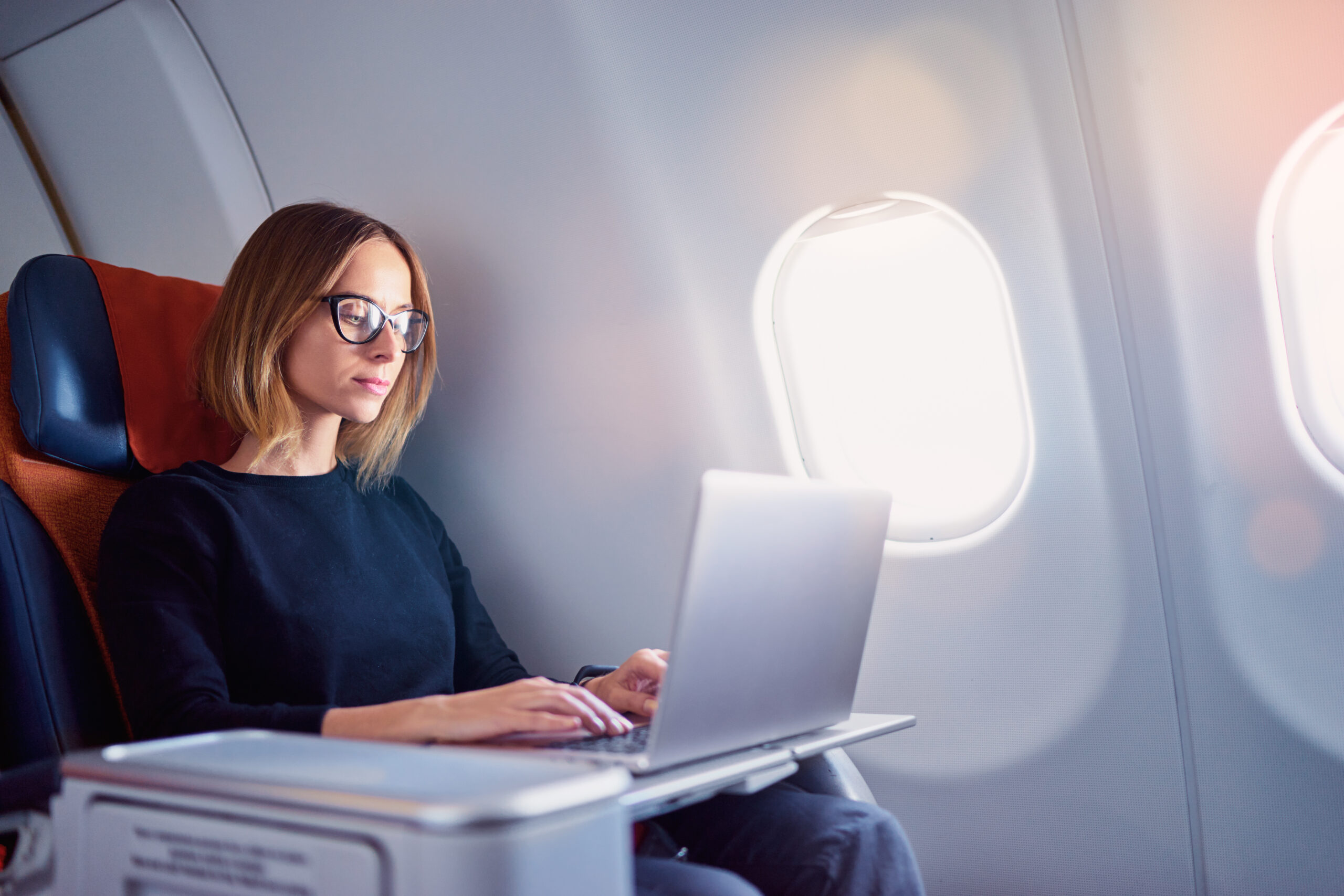 Woman on a business class flight